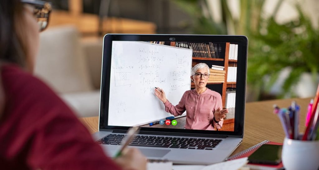 View of a screen with a teacher during an online course.